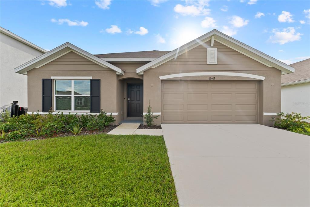 11402 Timber Grv Ln in Spring Hill, FL - Foto de edificio