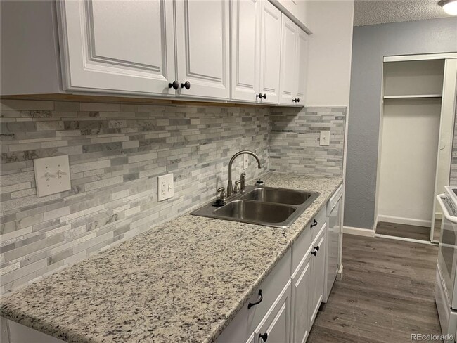 property at 7625 Quincy E Ave