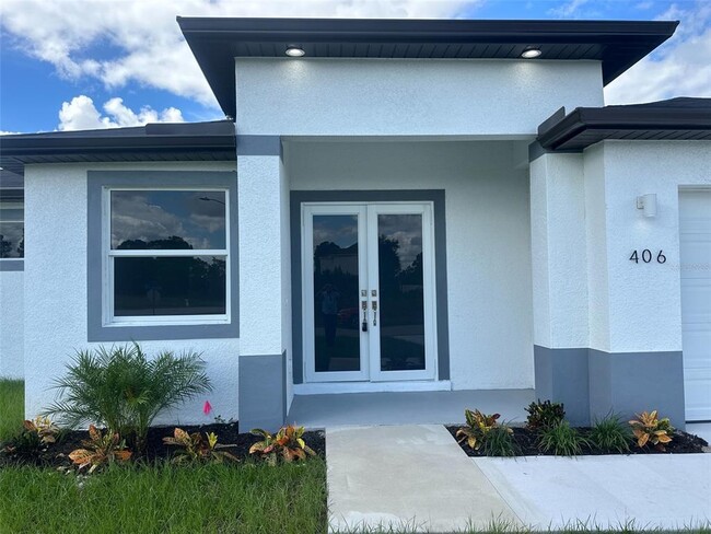406 Genoa Ave S in Lehigh Acres, FL - Foto de edificio - Building Photo