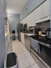 7400 W 20th Ave, Unit 213 in Hialeah, FL - Foto de edificio - Building Photo