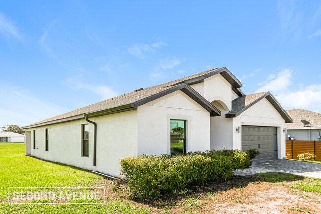 1313 NW 8th Pl in Cape Coral, FL - Building Photo - Building Photo
