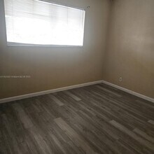 8700 N Sherman Cir in Miramar, FL - Building Photo - Building Photo