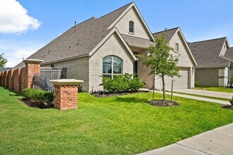 1703 Rustling Creek Dr in Sienna, TX - Building Photo - Building Photo