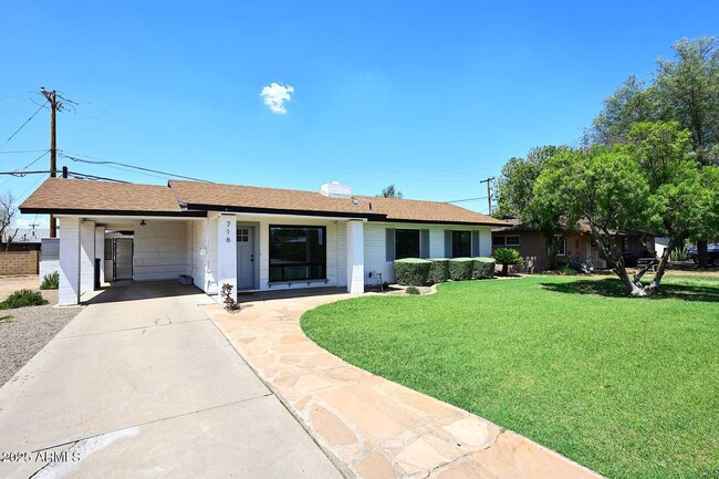 property at 716 W 11th St