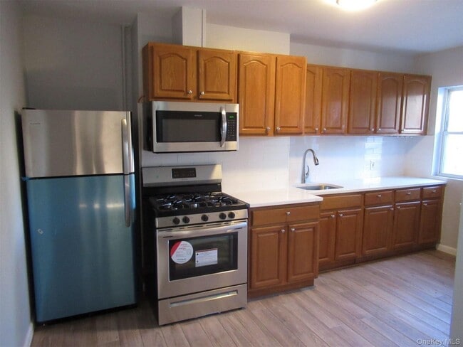 property at 60-91 54th St