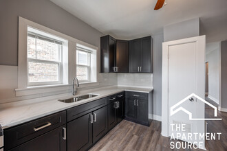 5128 W Henderson St, Unit 1 in Chicago, IL - Building Photo - Building Photo