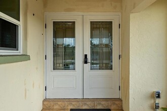 10 Stone Mountain Blvd, Unit 201 in Englewood, FL - Building Photo - Building Photo