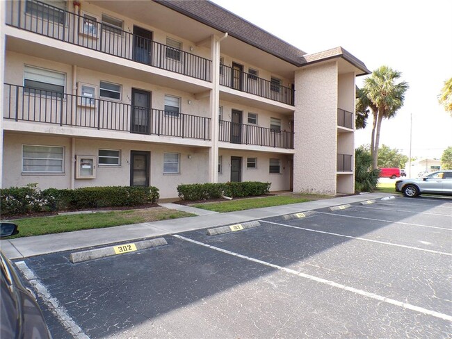 property at 102 Capri Isles Blvd
