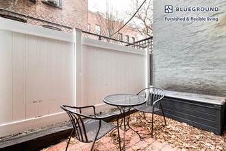 52 Barrow St, Unit FL1-ID2123 in New York, NY - Building Photo - Building Photo