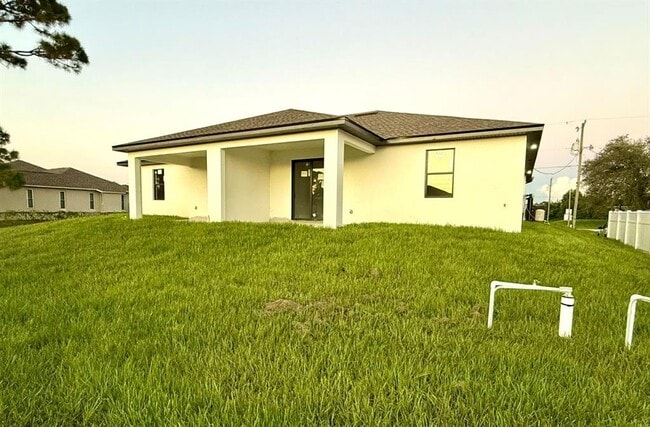 1043 Albany Ave in Lehigh Acres, FL - Building Photo - Building Photo