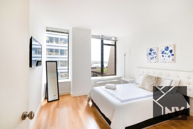 126 Pearl St, Unit 16F in New York, NY - Foto de edificio - Building Photo