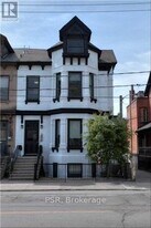 205 Gerrard St E in Toronto, ON - Building Photo