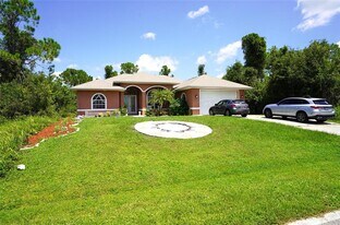 23438 Elmira Blvd in Port Charlotte, FL - Building Photo