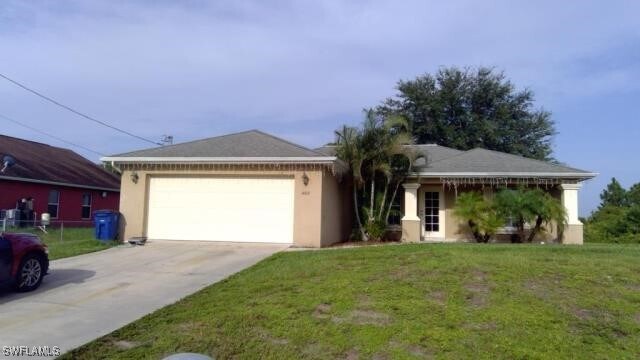 1402 Alan Ave S in Lehigh Acres, FL - Building Photo