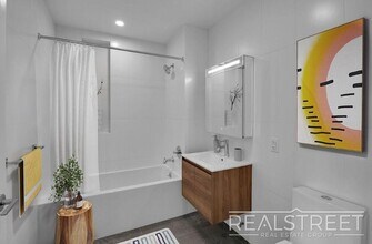 Stunning 2Bed 2Bath Apt with Private Balcony Prime location off the L next to McCarren Park in Brooklyn, NY - Building Photo - Building Photo