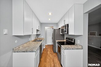 17403 E Mansfield Ave in Aurora, CO - Building Photo - Building Photo