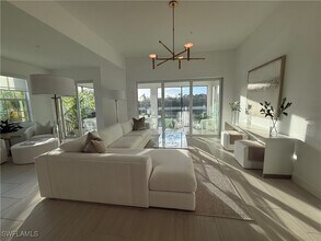 16885 Fairgrove Way, Unit 6-201 in Naples, FL - Foto de edificio - Building Photo