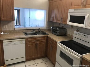 7801 Abbott Ave-Unit -408 in Miami, FL - Building Photo - Building Photo