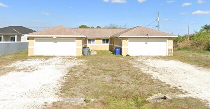 125 John Ave S in Lehigh Acres, FL - Building Photo - Building Photo