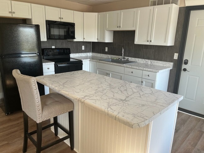 1401 Walnut St, Unit 2 in Dallas Center, IA - Building Photo - Building Photo