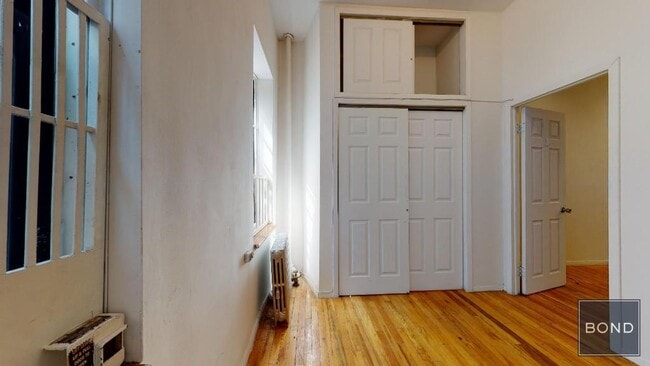 property at 214 E 10th St