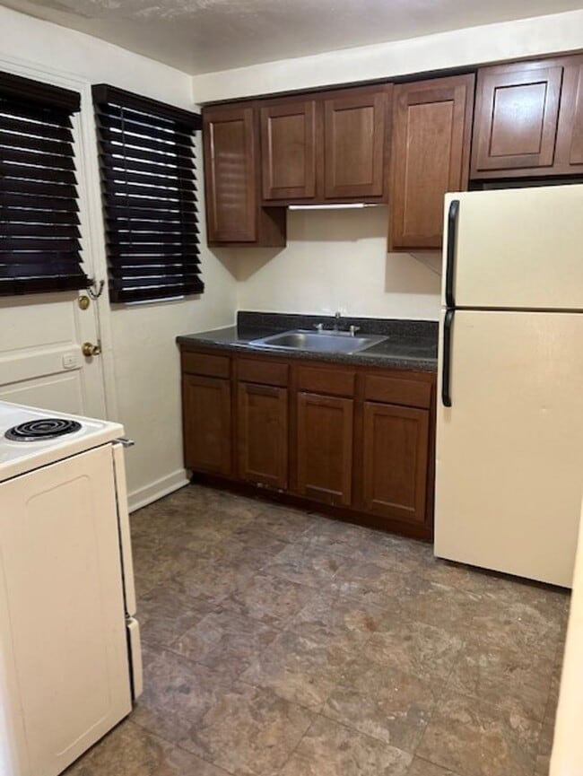 property at 1409 Woodlawn Ave