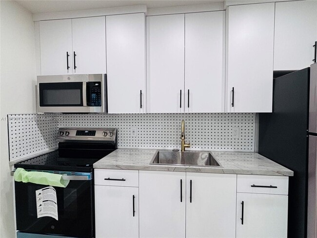 property at 220 NW 27th Ave