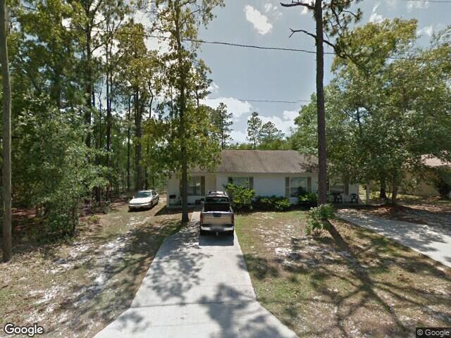 9308 N Travis Dr in Citrus Springs, FL - Building Photo