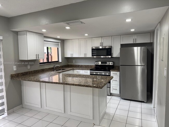 property at 8430 NW 8th St