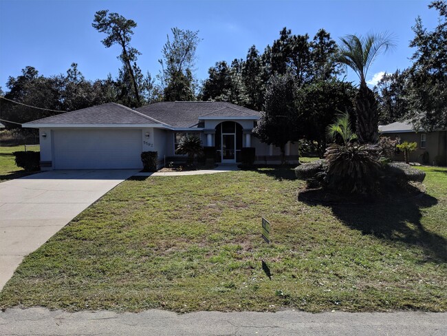 property at 5592 W Woodside Dr