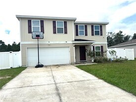 256 Begonia Ln in Poinciana, FL - Building Photo