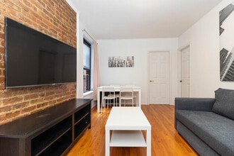 309-311-311 E 95th St in New York, NY - Building Photo - Building Photo