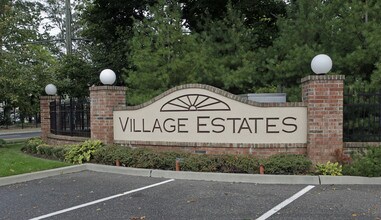 Village Estates in Amityville, NY - Building Photo - Building Photo