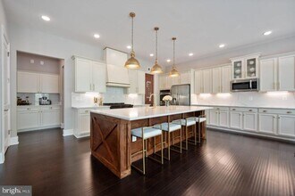 40946 Munson Woods Pl in Stone Ridge, VA - Building Photo - Building Photo