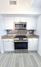9114 Lake Chase Island Way in Tampa, FL - Building Photo - Building Photo