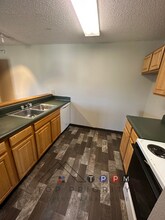 410 13th Ave NW, Unit Unit 21 in Oelwein, IA - Building Photo - Building Photo