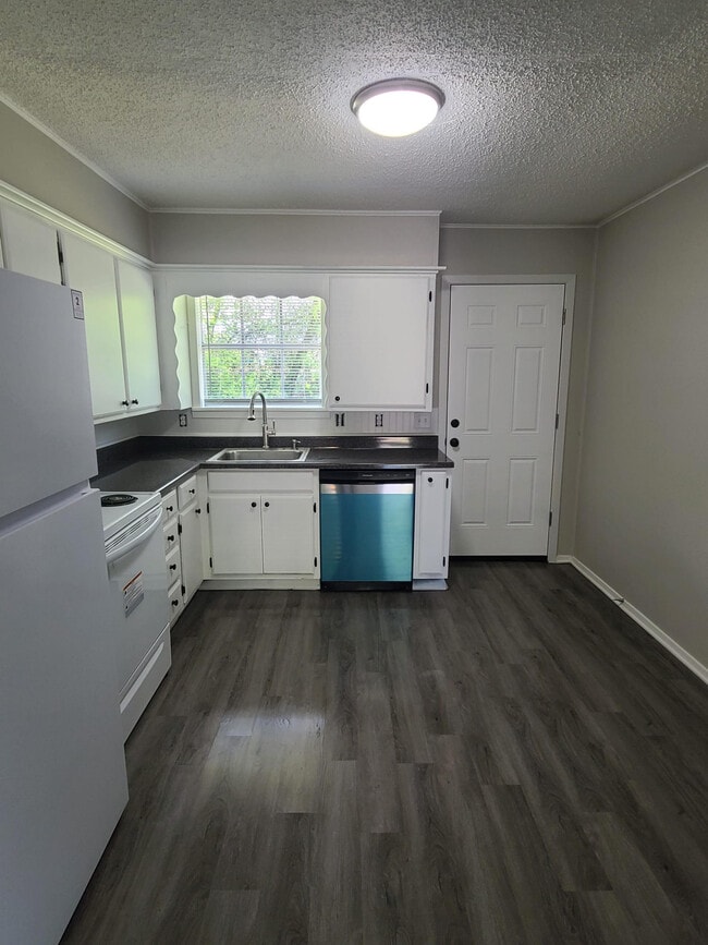 property at 220 Bois D Arc St
