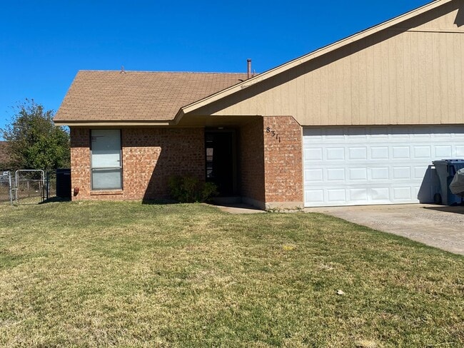 property at 8309 NW 7th St