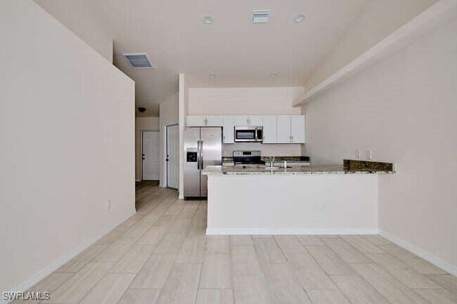 1303 SE 8th Pl in Cape Coral, FL - Building Photo - Building Photo