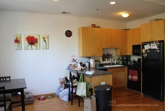 1446 N Leavitt St, Unit 1F in Chicago, IL - Building Photo - Building Photo