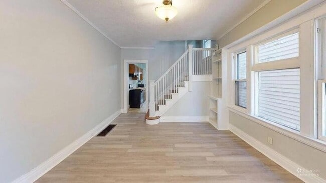 property at 65 Woodlawn St