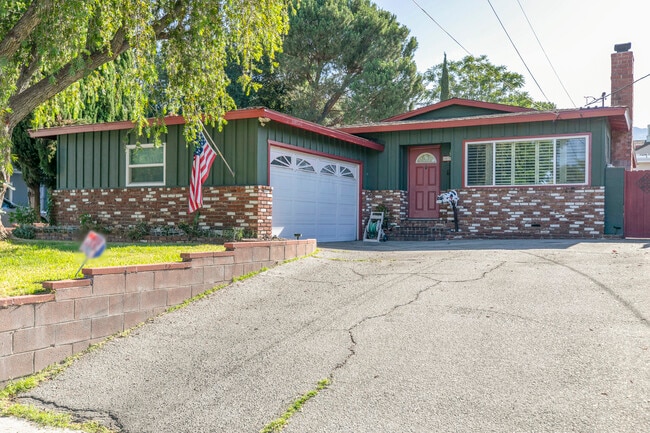 property at 10706 Rhodesia Ave