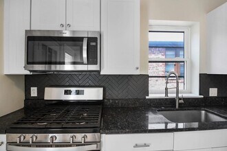 7104 Tulane Ave, Unit 2 in University City, MO - Foto de edificio - Building Photo