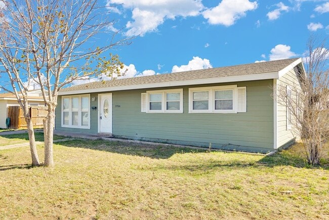 property at 3704 Travis Ave