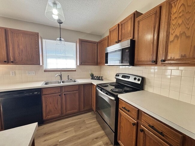 10307 W Yosemite Dr in Wichita, KS - Building Photo - Building Photo