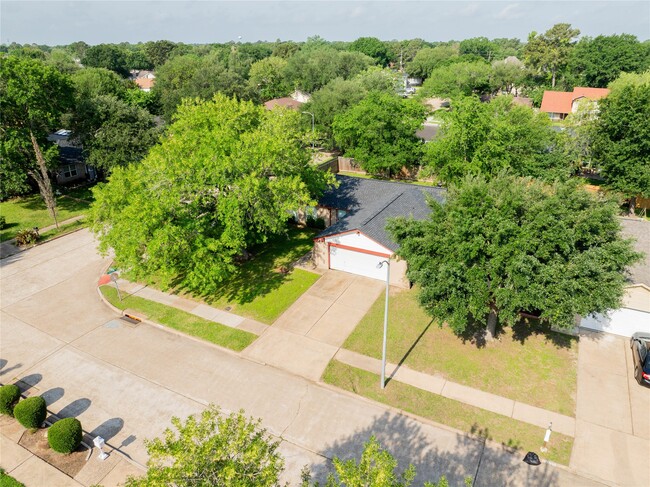 property at 7603 Wovenwood Ln