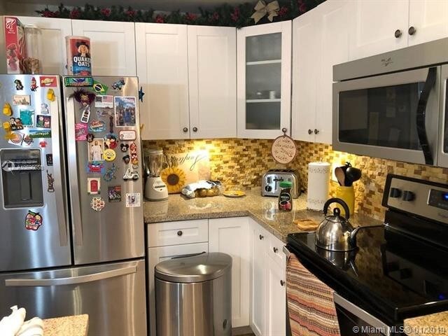 18350 NW 68th Ave-Unit -H in Hialeah, FL - Building Photo