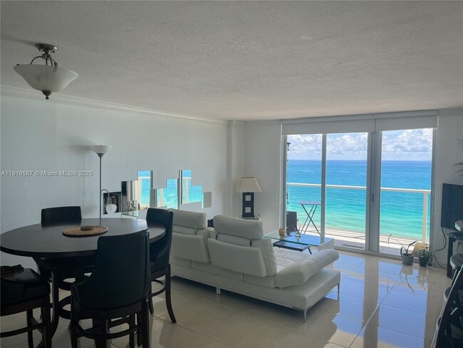 property at 5701 Collins Ave