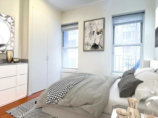 129 W 56th St in New York, NY - Building Photo - Building Photo