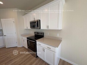19058 E 94th Pl in Commerce City, CO - Building Photo - Building Photo